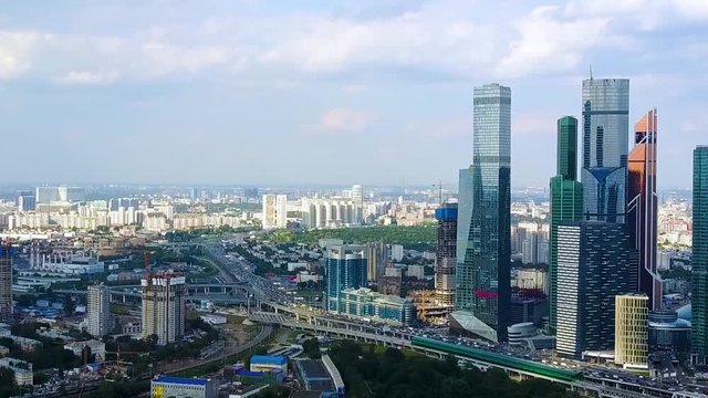 Aerial rising shot of International Business Center, office, shopping and residential skyscraper complex. Footage. Panoramic view from the hills of Vorobyovy Gory to the city of Moscow