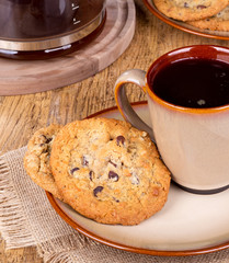 Chocolate Chip Cookies and Cup of Coffee on a Plate