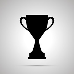 Black icon of winner cup with shadow