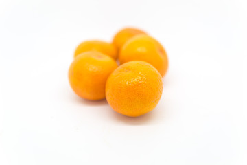 Satsumas against a White Background