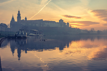 Fototapeta Krakow, Poland, Wawel Castle and Wawel cathedral in the morning over Vistula river  obraz