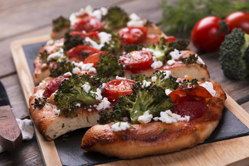 tart quiche with broccoli tomato and goat cheese