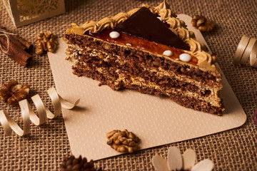 Slice of biscuit cake with chocolate