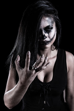 Young woman with a skull makeup