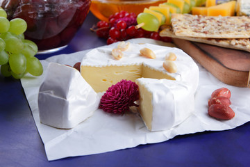 Cheese, camembert, wooden board, pear, Christmas cheese, honey, cherry jam, green grapes, dark blue background, pop art, red berries, Mexican cuisine, Indian cuisine