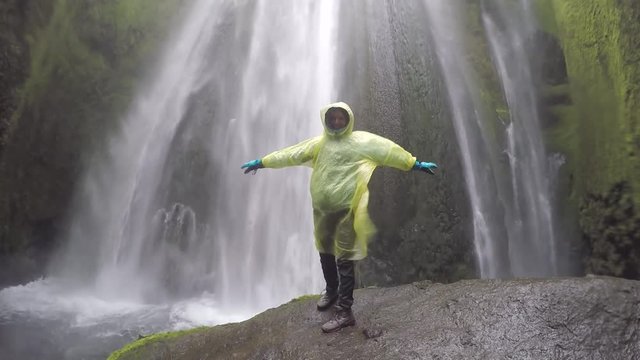 Standing under Gljufurarfoss - amazing hidden waterfall in Iceland