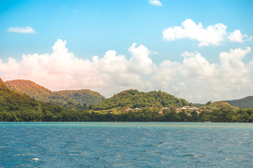 Fototapeta na wymiar Le Marin, Martinique, Caraïbes: côte montagneuse vue de la mer