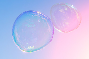 big soap bubble over a blue sky background - Powered by Adobe