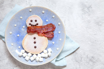 Funny snowman Christmas morning breakfast pancakes for kids