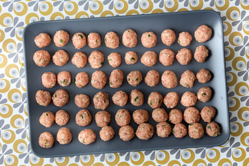 a dish of meatballs seen from the top