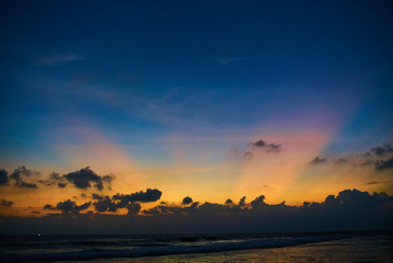 Obraz na płótnie Canvas Beautiful sunset over ocean aerial shot