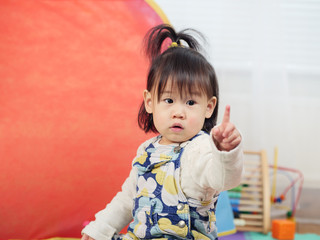 baby girl play toy at home