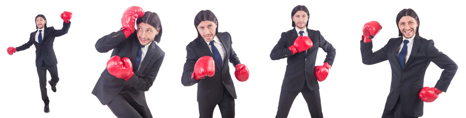 Businessman with boxing gloves on white