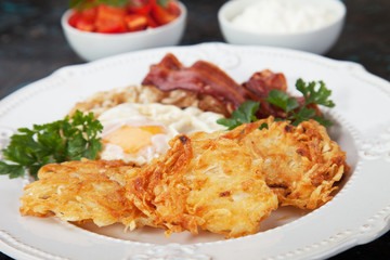 Hash browns with egg and bacon