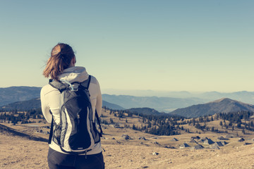 Fototapeta premium Woman enjoying highland view.