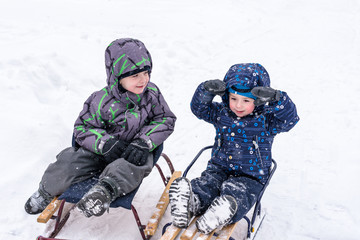Happy friends having fun with snow