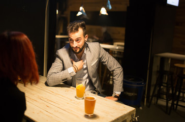 Man in a pub, suprised