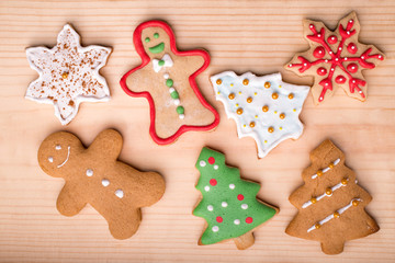 Obraz na płótnie Canvas Gingerbread christmas cookies on a wooden background.