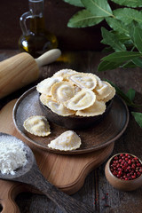 Italian Cuisine. Raw ravioli with Ricotta and olive oil