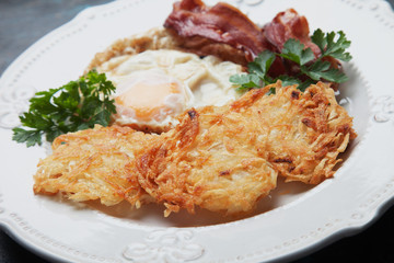 Hash browns with egg and bacon