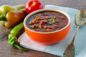 Bowl of traditional soup Borscht on table
