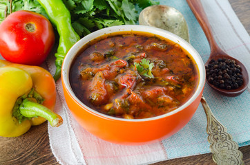 Bowl of traditional soup Borscht on table