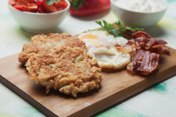 Hash browns with eggs and bacon