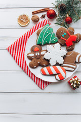 Homemade delicious Christmas gingerbread cookies on the plate.