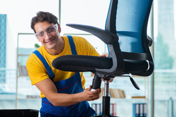 Furniture repairman working on repairing the chair