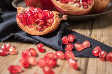 Pomegranate fruit on rustic table
