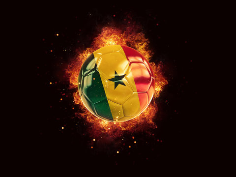 Football in flames with flag of senegal