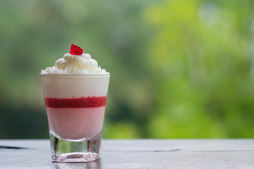 Strawberry mousse cake in a small glass