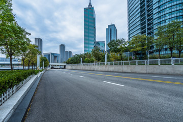 Fototapeta na wymiar city road through modern buildings in Tianjin