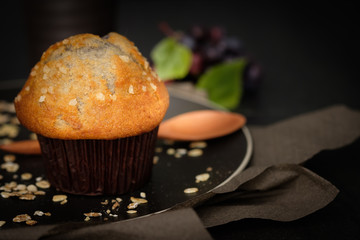 Still life blueberry muffins in a rustic style.