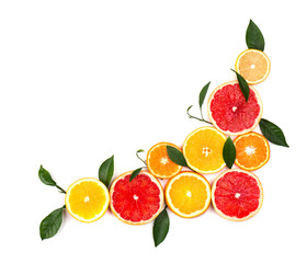 Fototapeta na wymiar Isolated citrus fruits. Pieces of lemon, lime, pink grapefruit and orange isolated on white background, with clipping path. Top view