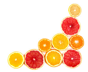 Isolated citrus fruits. Pieces of lemon, lime, pink grapefruit and orange isolated on white background, with clipping path. Top view