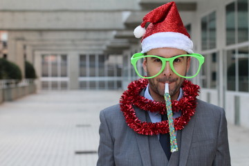 Eccentric businessman dressed up to party hard