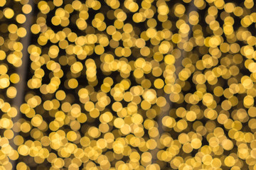 beautiful abstract yellow bokeh light texture for background and wallpaper