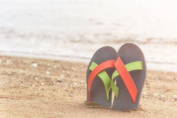 Flip flop on the beach.