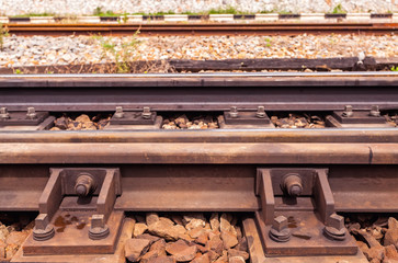 Close up the rusted train tracks