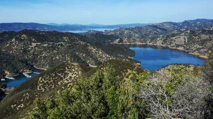 Garden poster Hill Aerial view of Lake Berryessa from the Blue Ridge Trail, Stebbins Cold Canyon, on a sunny day, featuring the surrounding blue oak woodland and the cove marina in the fall of 2017