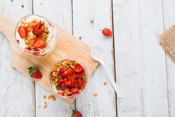 Strawberry , granola and yogurt healthy breakfast parfait