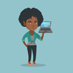 Young african-american woman holding a laptop with a shopping cart on a screen. Woman using a laptop for online shopping. Woman doing online shopping. Vector cartoon illustration. Square layout.