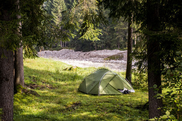 Camping tent in wood during hiking trip to Austria