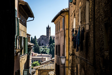 Look through the alleys of Siena Italy