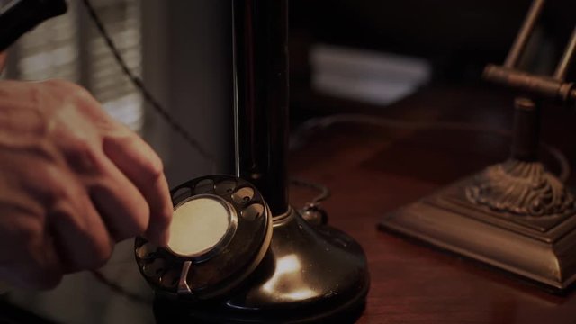  man from twenties or thirties talking on a candle stick phone 4k