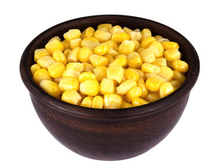 Sweet corn kernels in bowl over white