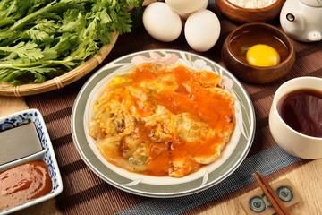 Oyster omelet,famous snack food at night market in Taiwan.
