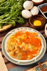 Oyster omelet,famous snack food at night market in Taiwan.