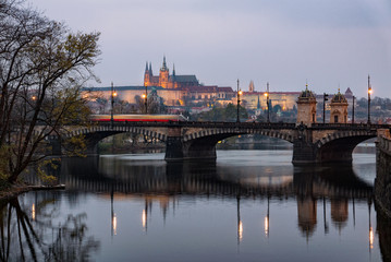Fototapeta na wymiar Scenic view of bridges on the Vltava river and historical center of Prague with Prague Castle, buildings and landmarks of old town,Prague,Czech Republic.
